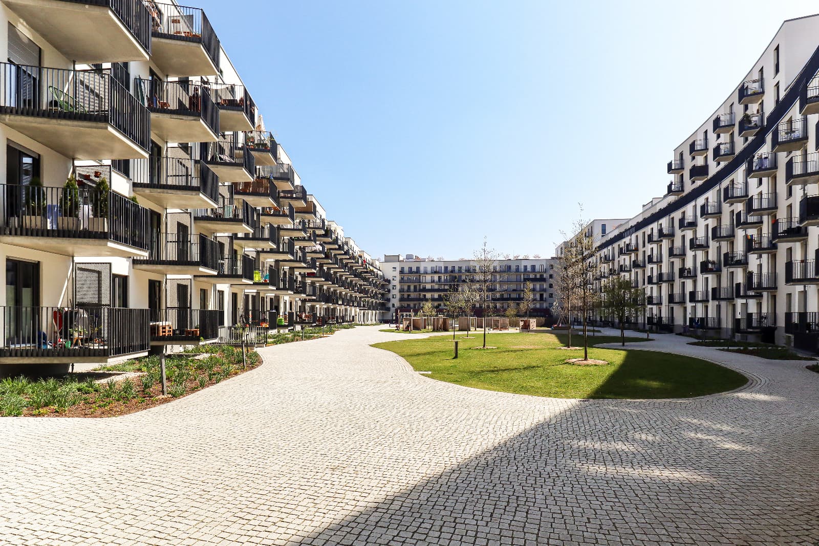 Exterior view of an apartment complex courtyard.