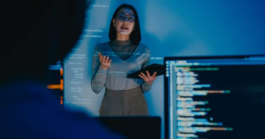 A woman giving a presentation in a professional setting
