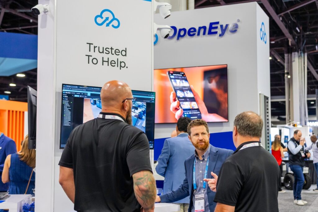 The OpenEye booth at GSX 2026, with a sign that reads "Trusted To Help."